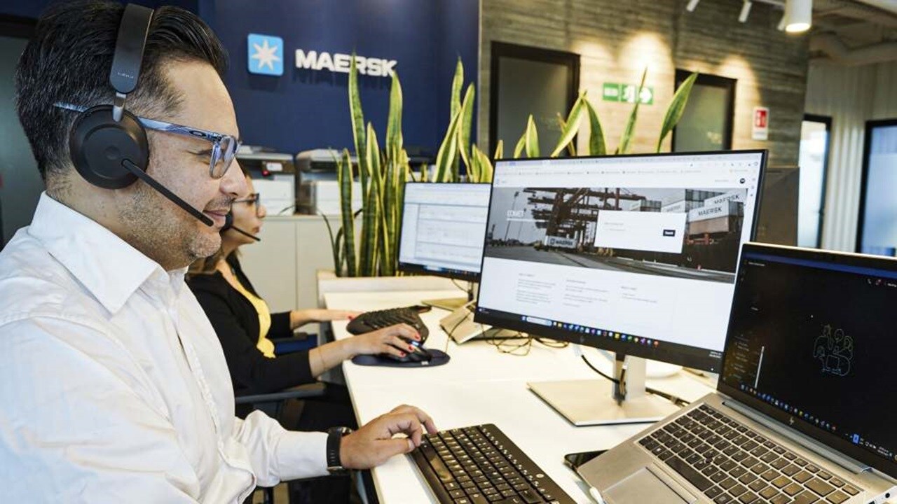 Employee from customer support working at desk 