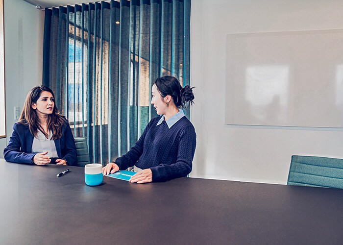 People in office meetings