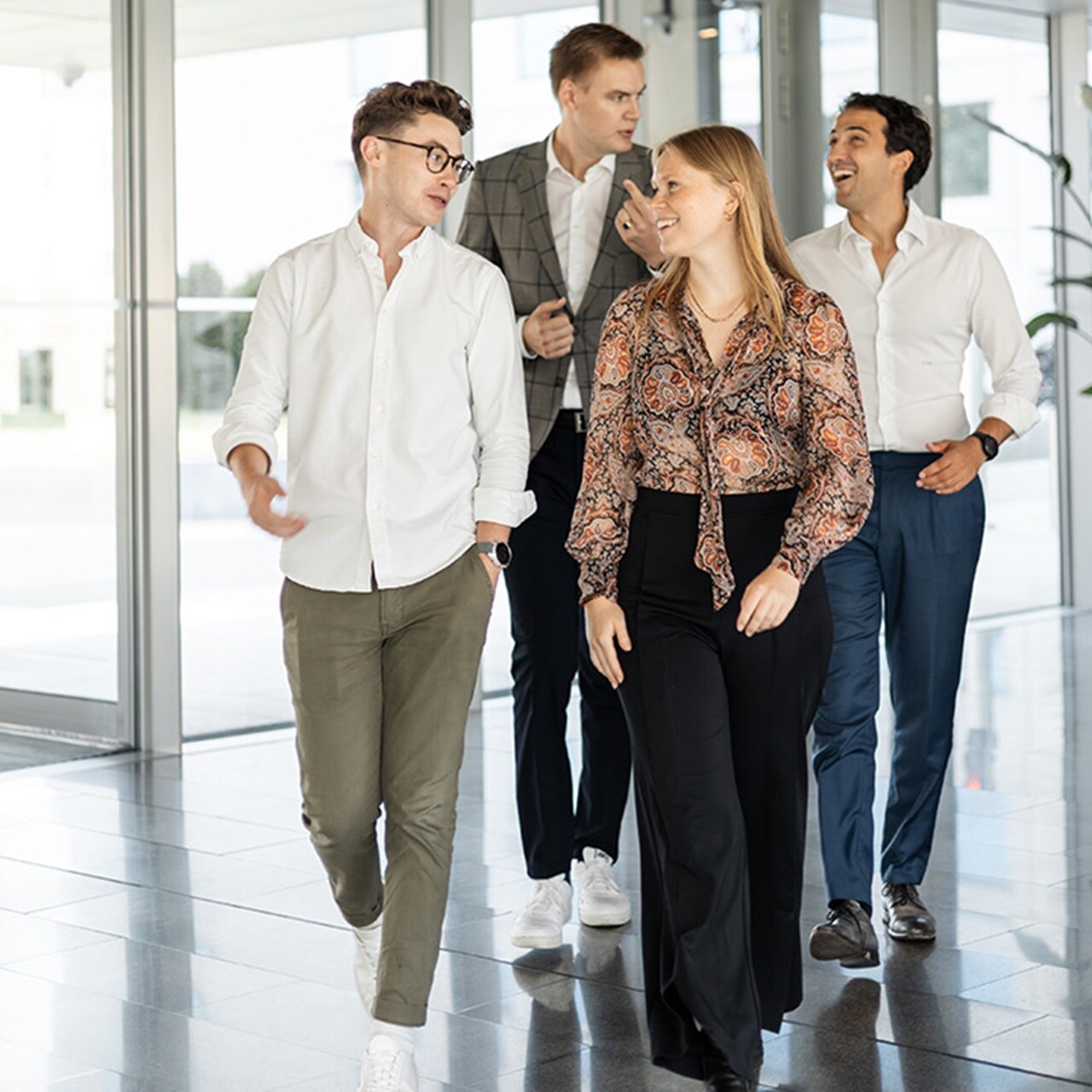 Employees walking at office premises