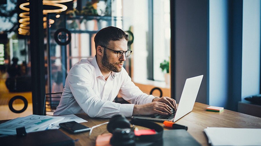Man in front of laptop