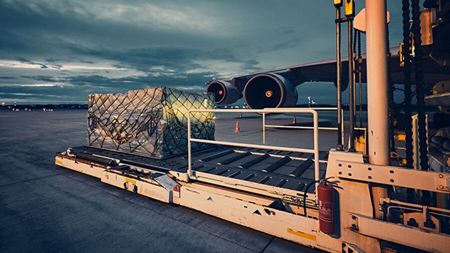 Plane at airport with cargo