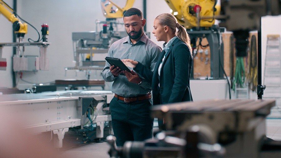 A man and woman in a factory