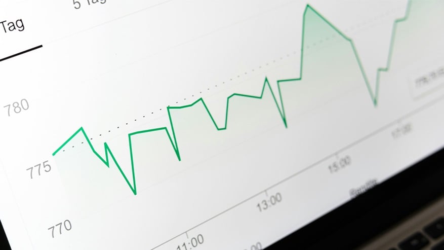 Line graph showing fluctuating data trends over time on a computer screen.