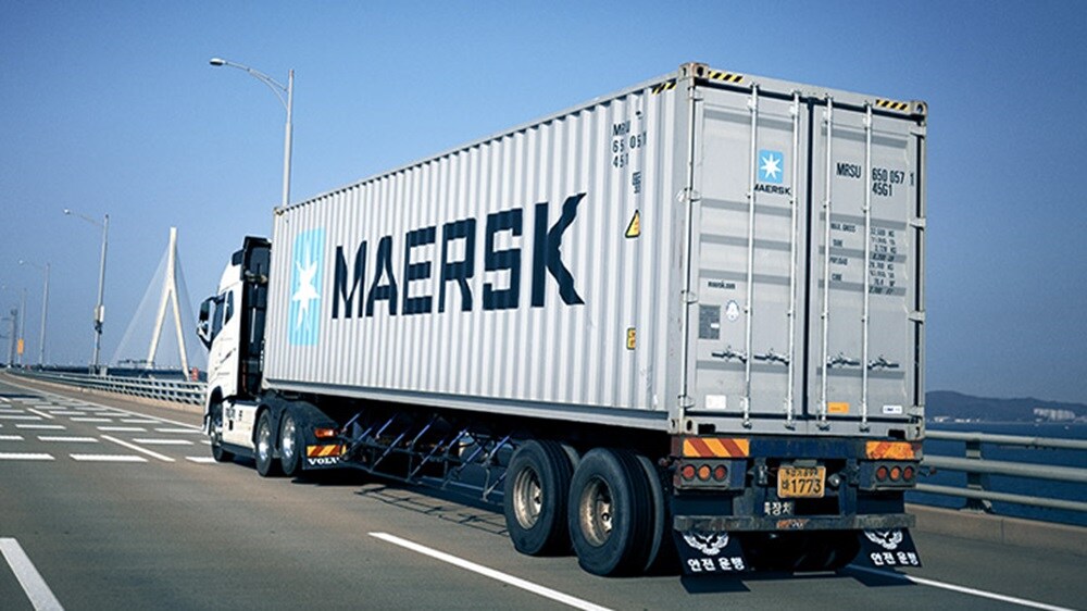 A truck carrying a Maersk refrigerated container with temperature-sensitive cargo.