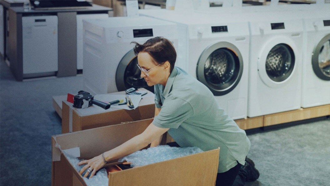 Woman in washing machine supply chain