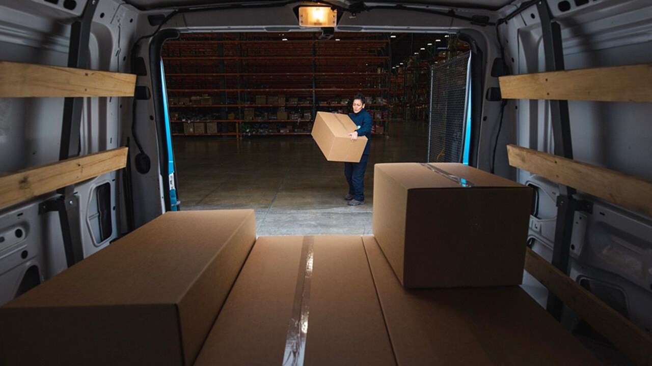 An inside view into delivery van with parcels ahead of Black Friday sales