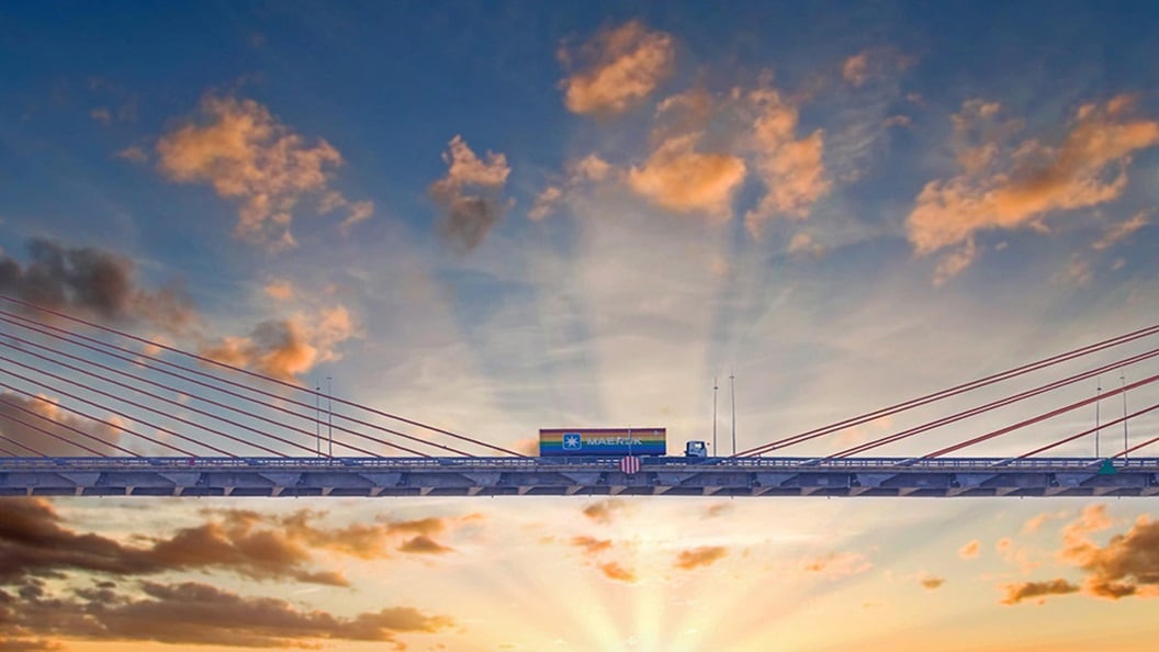 Maersk rainbow container on bridge at sunrise
