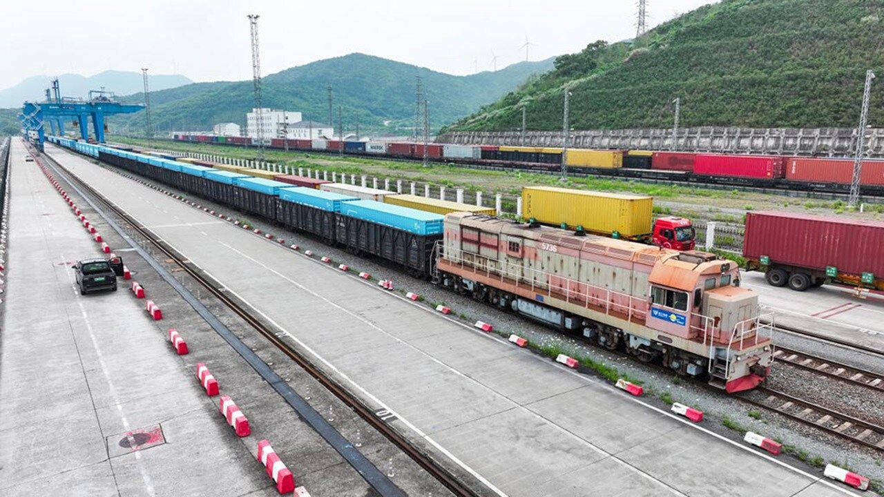 Blue containers at a rail yard