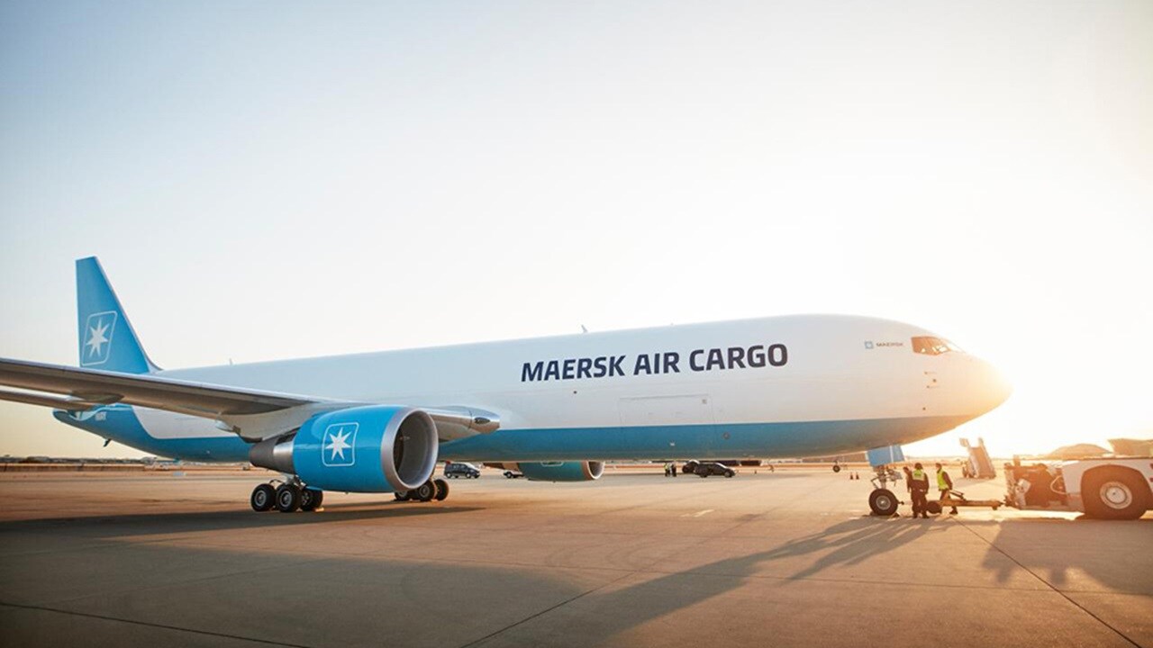 Maersk Air Cargo plane on the runway at sunset for North American air freight logistics