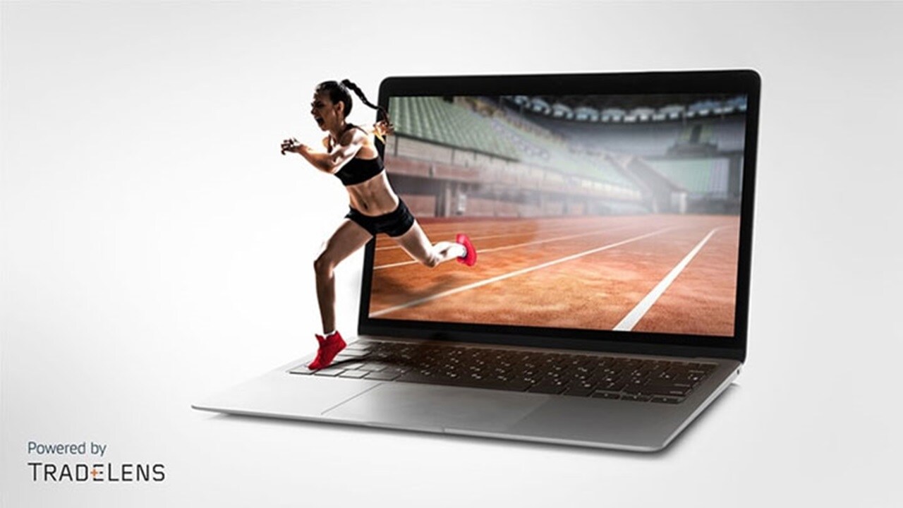 TradeLens - A laptop with a woman athlete powering her way from a racetrack, indicating the shift in Puma’s supply chain.