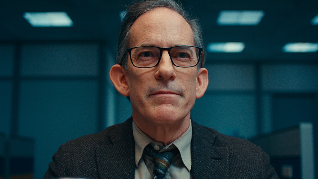 A man with glasses.